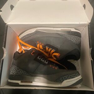 Jordan Black and Orange Sneakers with Signature Elephant Print